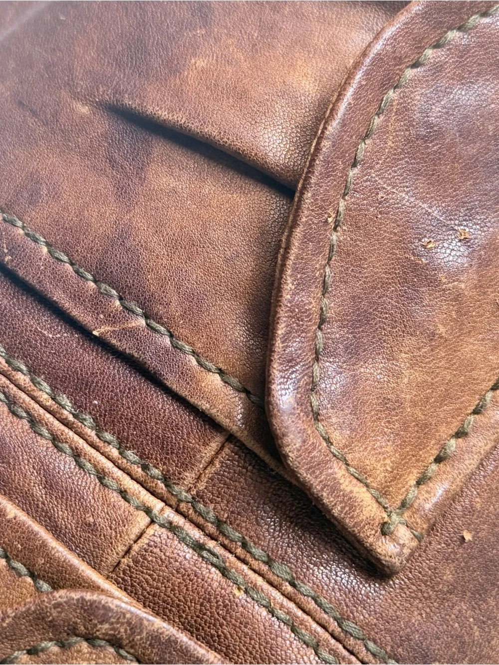 Hyper Distressed Fossil Vintage Bag.